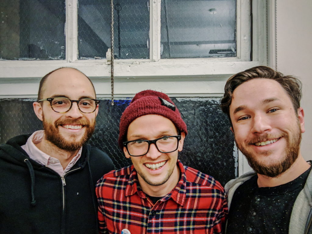 Evan Forde Barden, Mikey Erg, and Patrick Cartelli taking a selfie.